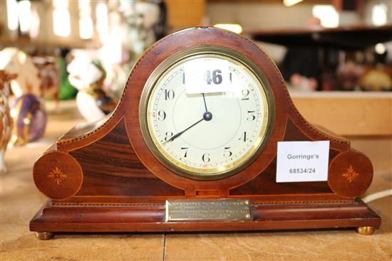 A 1920s inlaid mahogany eight day timepiece